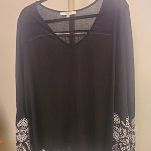 Black top with white lace accents